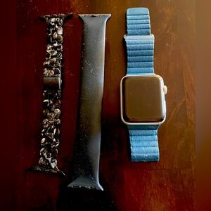 Apple Watch Series 3 + 3 bands, no charger.